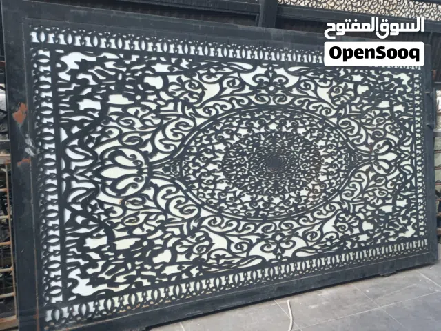 باب كراج ليزر بحال الوكاله مع كامل اغراضو