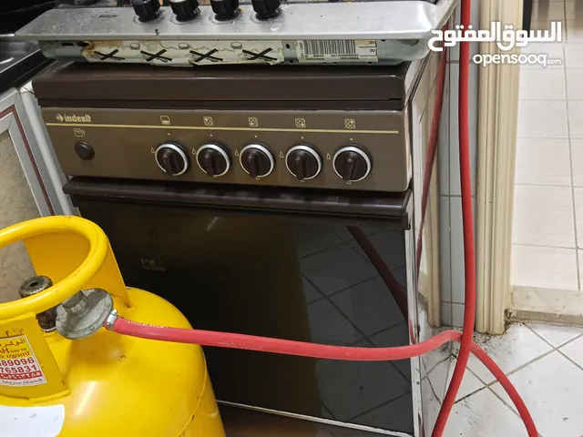 urgent selling 4 burner stove with cylinder