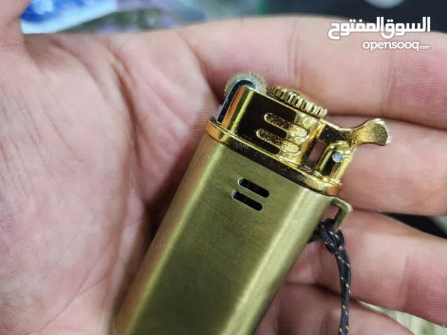 ولاعه دافور ذهبي