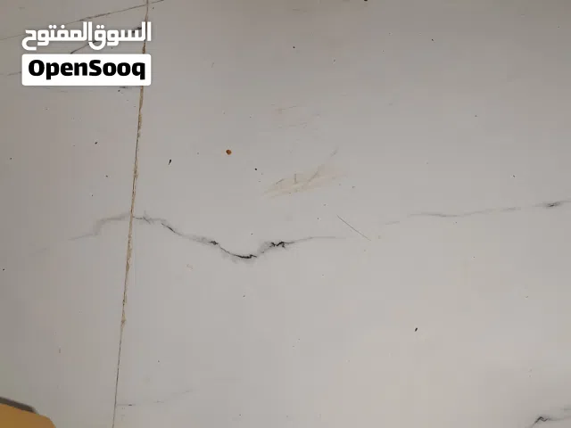 small microwave oven 1 years old and tea kettle..