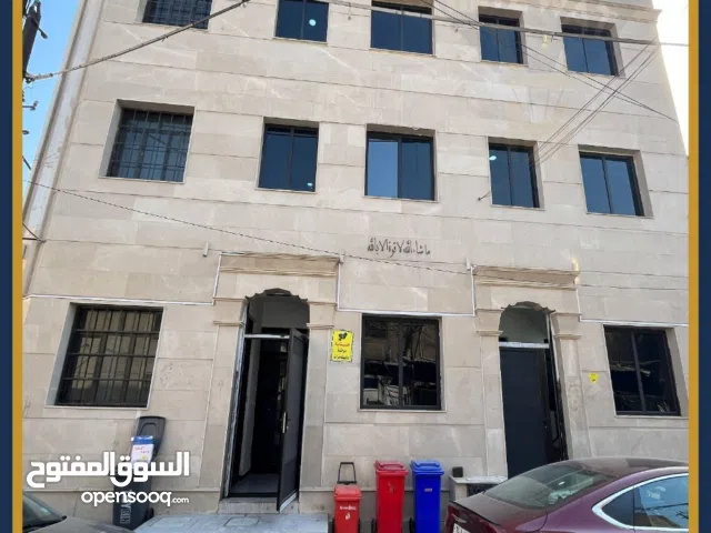 بناية تجارية ركن للبيع في حي الجامعة قرب العاب جوي لاند