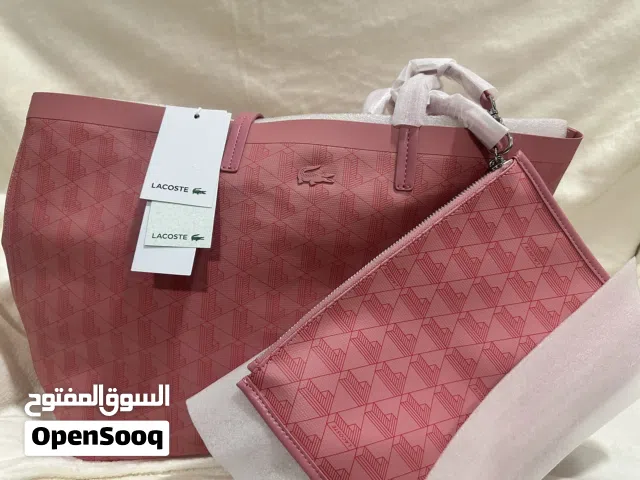 Lacoste Tote Bag Pink 100% Authentic  Brand New. Discounted before 60 now 55 Riyals Free shipping