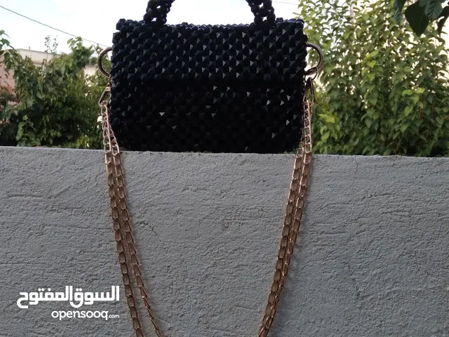 حقيبة يد خرز