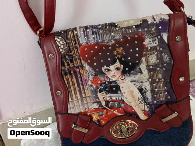 حقيبة زرقاء وخمرية جميلة للبنات