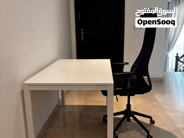 IKEA table and officer chair