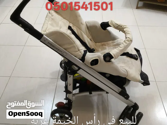 baby stroller and slide for sale in Ras Alkhaima