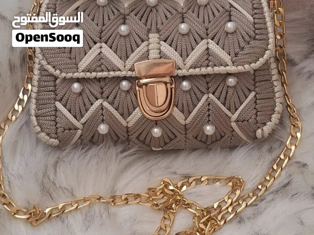 شنطة يد هلند ميد كانفا