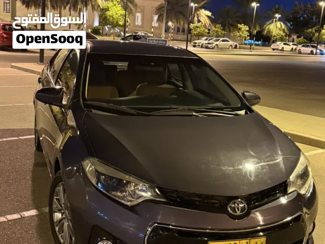 تويوتا كورولا 2015 رمادي صالون سيدان مستعملة بحالة جيدة مع مواصفات أمريكية