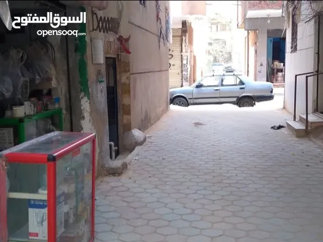 مخزن للايجار بفيلا بالف مسكن أمام مستشفى التأمين الصحي ومسجد المصطفي بالقرب من محطة مترو الف مسكن