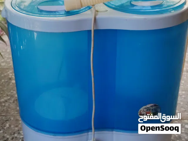 غسالة ملابس صغيرة