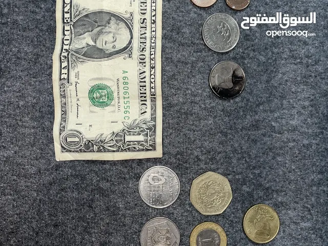 عملات اماراتية قديمة وعملات لدول اخرى قديمة