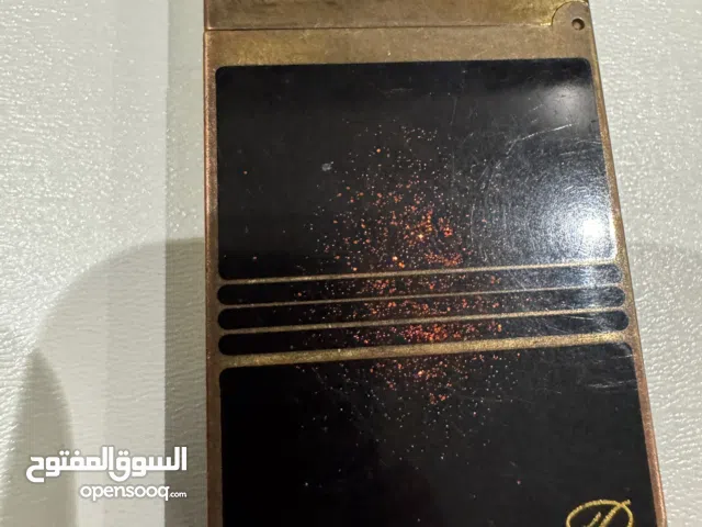 ولاعة فاخرة نادرة S.T. Dupont – لون أحمر ملكي (Vintage