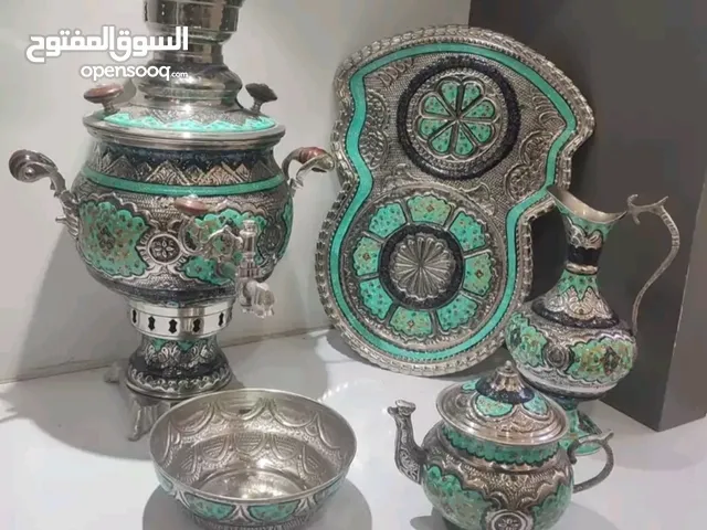 ساعة برونزية ملكية وشمعدان مع اليشم