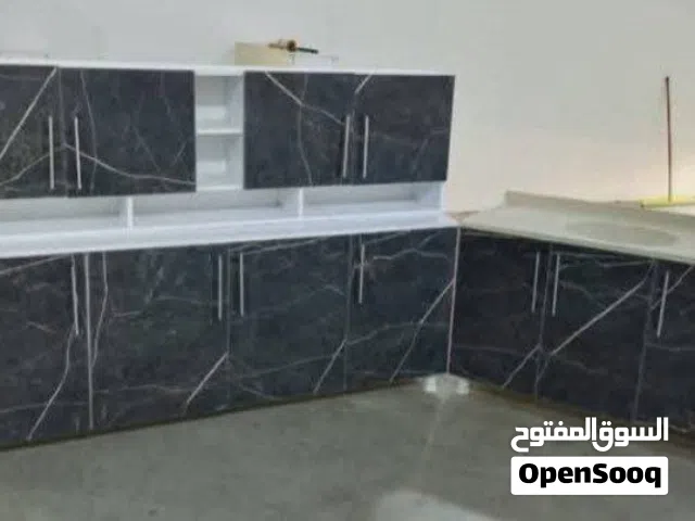 كاونتر خشب mdf  القياس مترين ارضي وملحق مع سنك متر و20