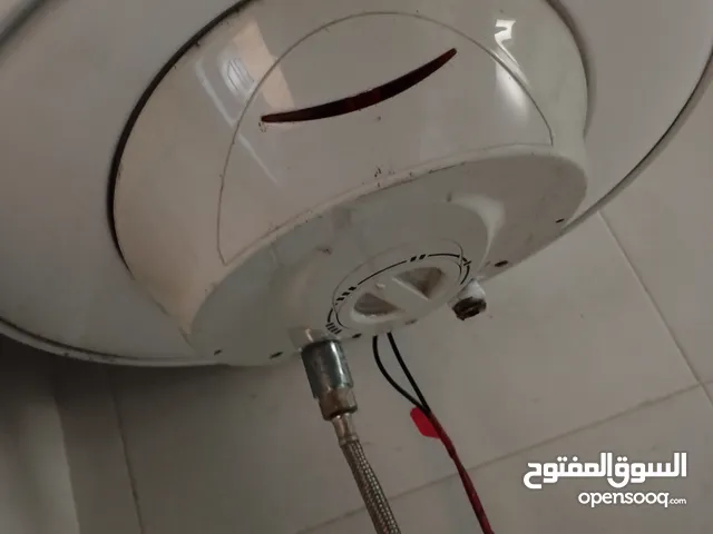 ثلاجة عرض و جيزر كهرباء