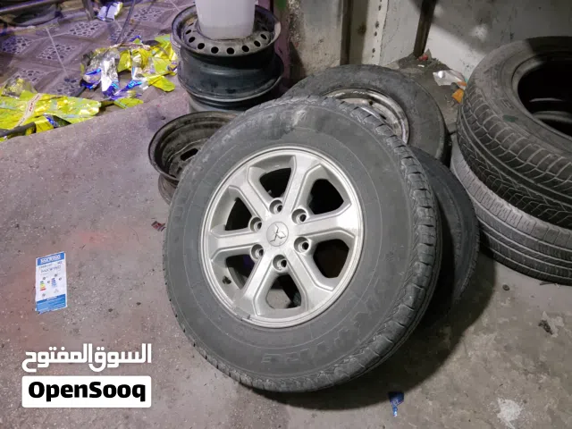 جنط متسوبيشي وكوشوك وحساسات طقم كامل 4 حبات