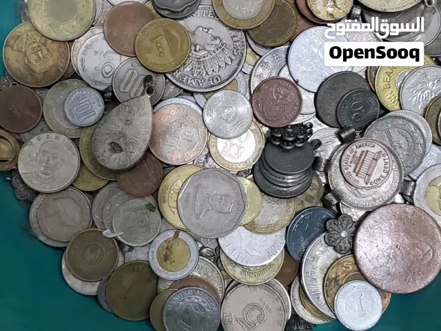 عملات معدنيه عالميه متنوعه بالحبه ويوجد اخر بالكيلو