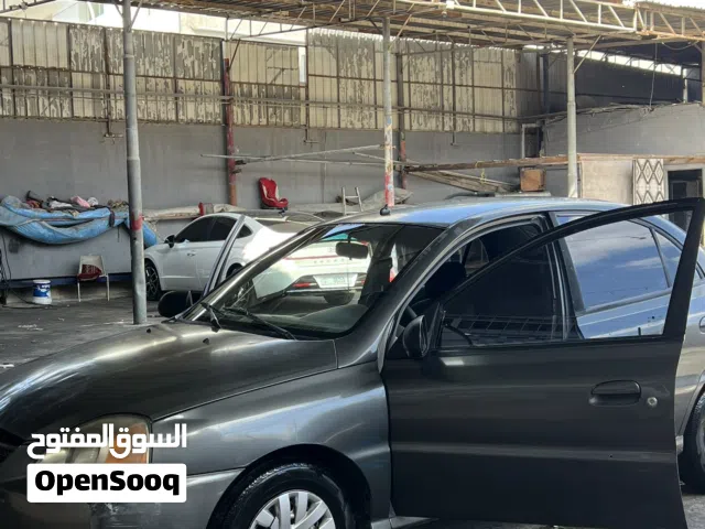 2003 كيا ريو Standard