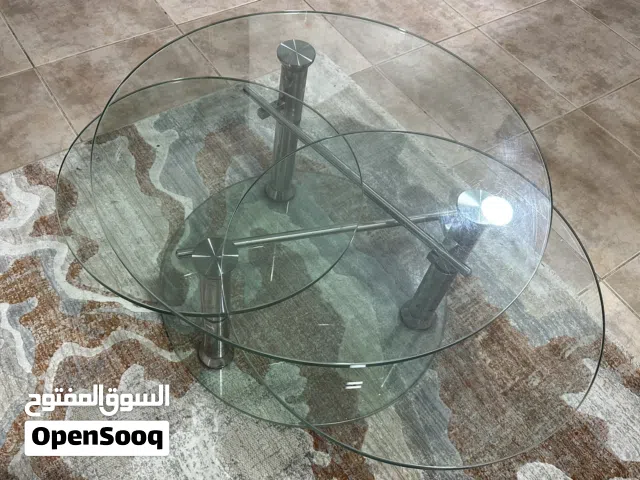 تربيزه زجاجيه تعمل بنظام الفتح و الغلق