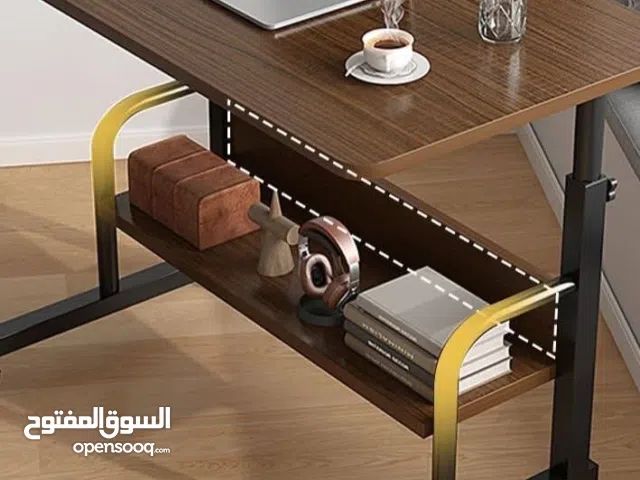 طاولة لابتوب عملية .