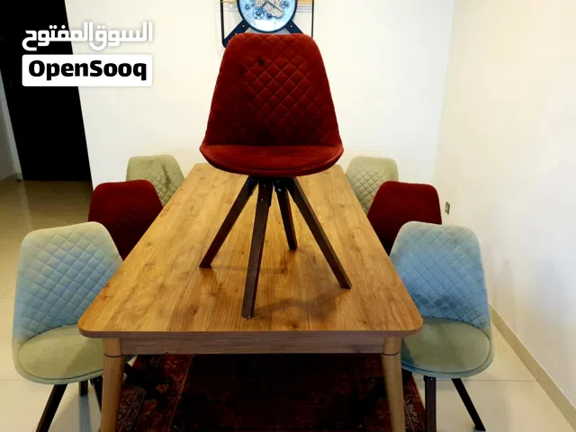 Premium 8-Seater Designer Dining Set with 360-degree swivel chairs