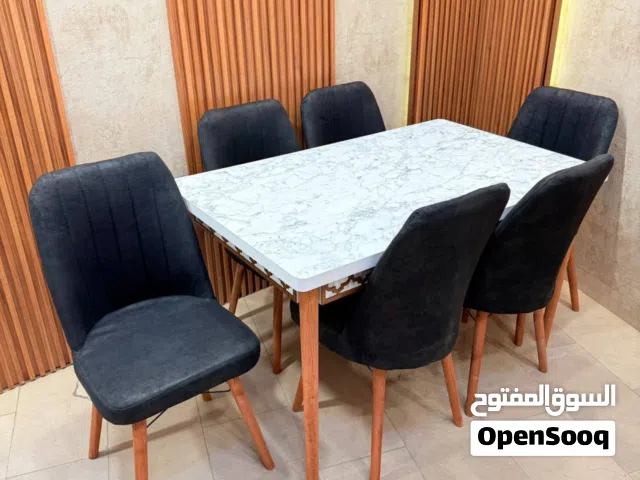 ميز طعام 6 كرسي سطح خشب ثابت قياس الميز 80 * 130 سم جوانب cnc كرسي مخمل وتر بروف هيكل الكرسي حديد