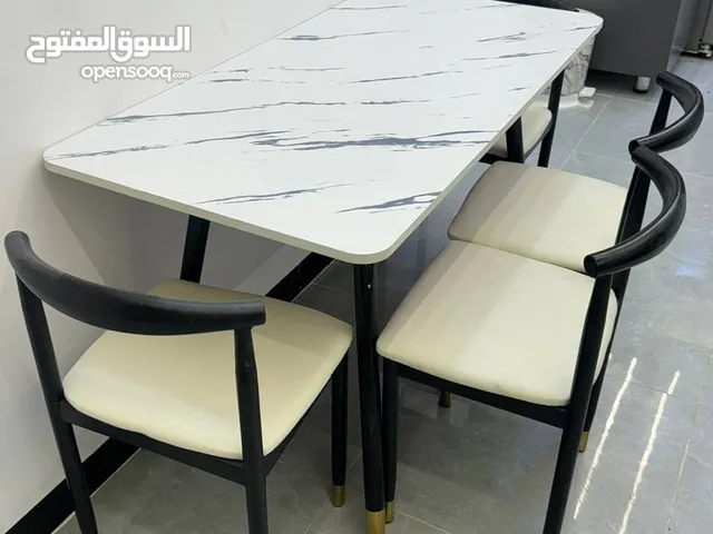 ميز طعام خشب 4 كرسي  هيكل الكرسي حديد  الطاولة خشب mdf