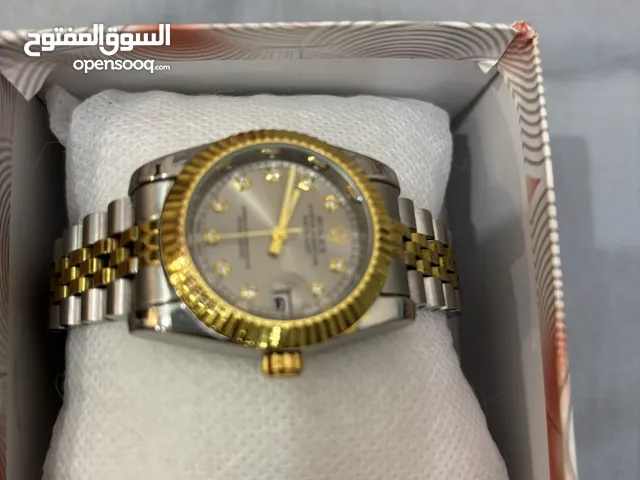 ساعه جديد غير مستعمله مع فساتين