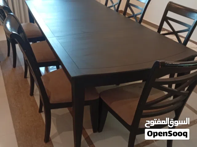 طاوله طعام تتكبر وتصغر