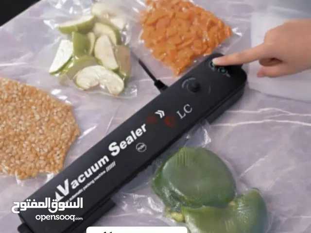جهاز تفريغ هواء وتغليف المواد الغذائية والتمور