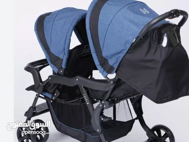 عربة اطفال توائم..لون بيج ..بحالة ممتازة جدا