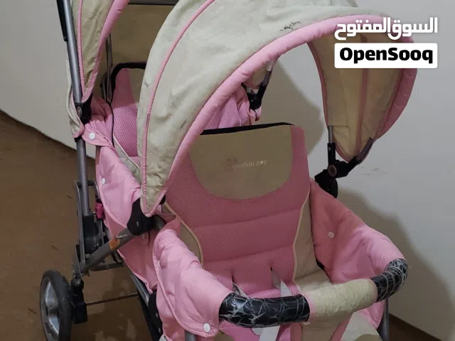 عربة أطفال لتوأم أو طفل واحد