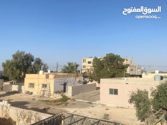 بيت مع  ارض للبيع او البدل على شقه في عمان الغربية