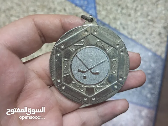 ميدالية بطول الهوكي قديمة 2004