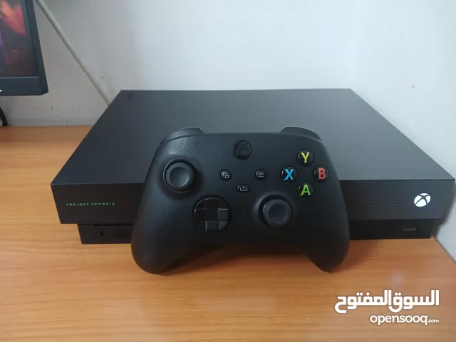 limited edition xbox one x wirh 40 games price negociable(very good price like brand new)