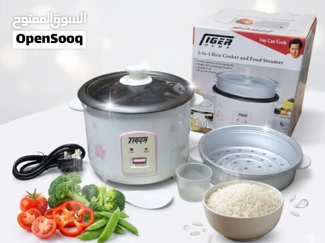 هذا هو جهاز طهي الأرز من Tiger  بقدرة350w   5 في 1.يحتوي الصندوق على جهاز طهي الأرز، وسلة للتبخير،