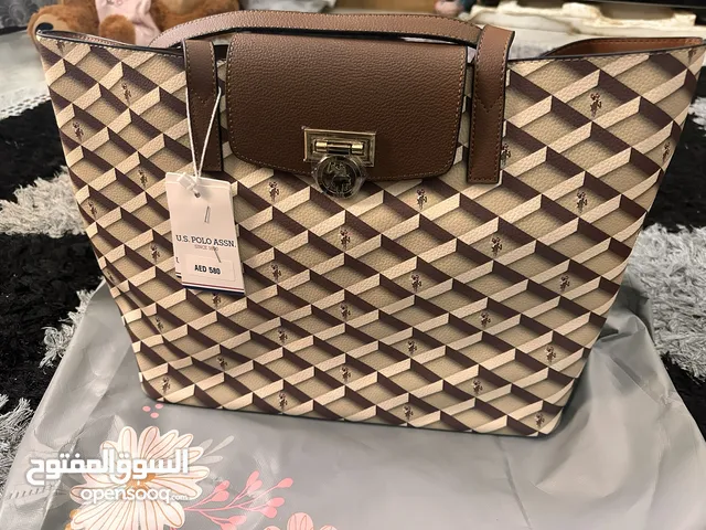 شنطة يد نسائية جديدة ماركة  us polo من  اصليه قطعتين