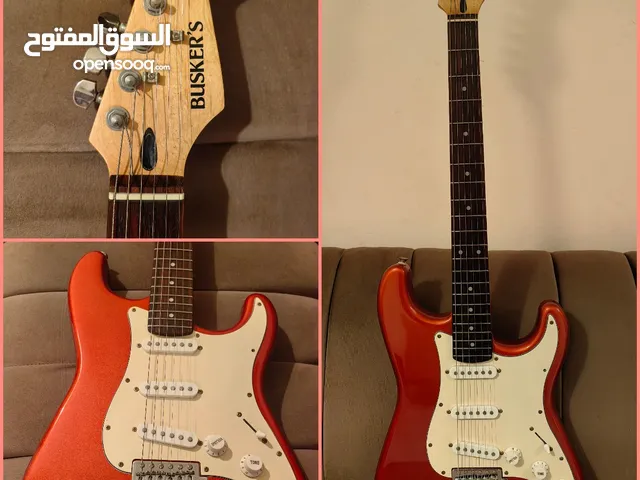 Busker guitar