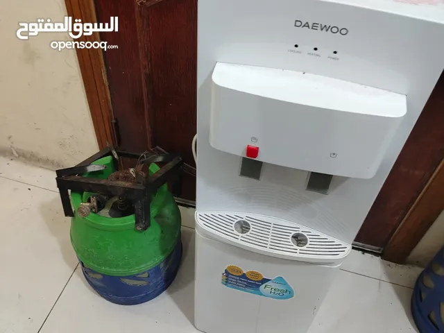كولر ماء حامي بارد نوع دايو شبه جديد غاز مع منظم مع بربيش اسطوانه غاز حجم صغير مليانه