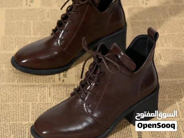 حذاء بوت جلد نسائي