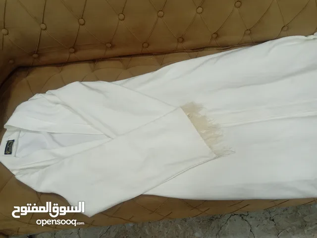 بشت طويل. ملبوس مرة وحدة كوالتي كلش حلو ويخبل