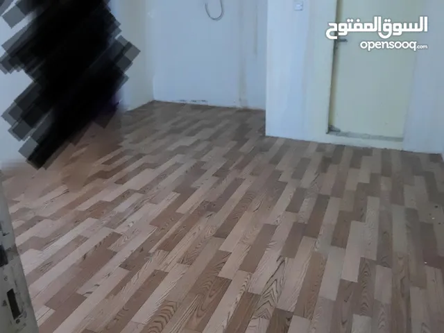 small room with attached bathroom and kitchen