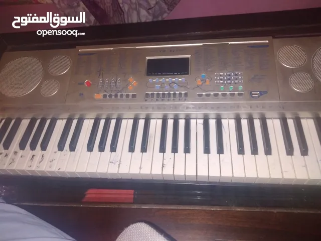 أورغ كامل لجميع أنواع الموسيقى التي ترغب بها مع تغيير الصوت والنغمات والايقاع YM-823
