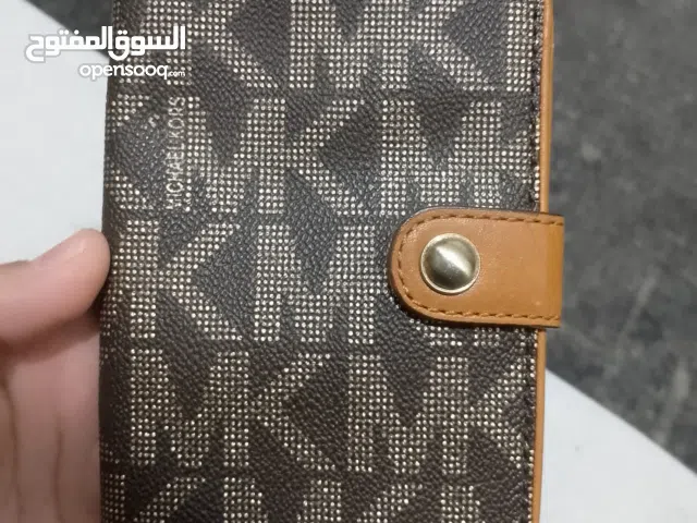 حافظه جواز السفر من شركه مايكل كورس