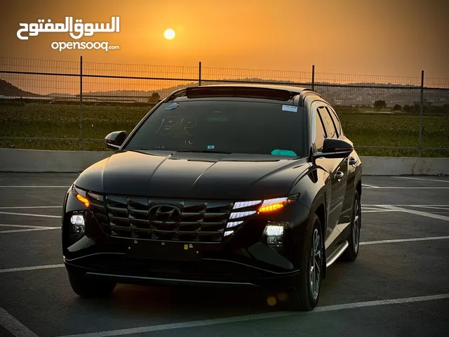 هونداي توسان/2022 فل الفل فتحة سقف بانوراما 2x4 ///240Hp بنزين + كهرباء ( Haybrid) 1600cc
