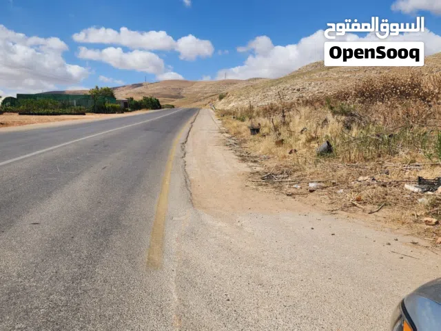ارض للبيع الزرقاء واجهيتها على شارع الرئيسي طواحين العدوان