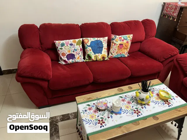 Comfortable and stylish red sofa set in very good condition.
