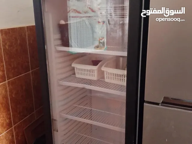 تلاجة قرين كولا