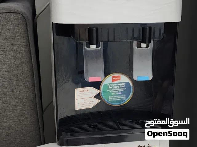 مبرد مياه impex  مع خزانة سفلية بحالة ممتازة water cooler and heater