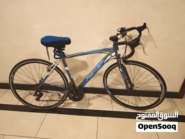 Used road bike - alloy frame with drop handlebars,